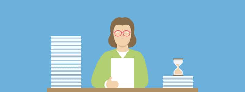 Illustration of a person with glasses sitting at a desk, holding a sheet of paper, with a large stack of papers on one side and an hourglass on top of books on the other side.
