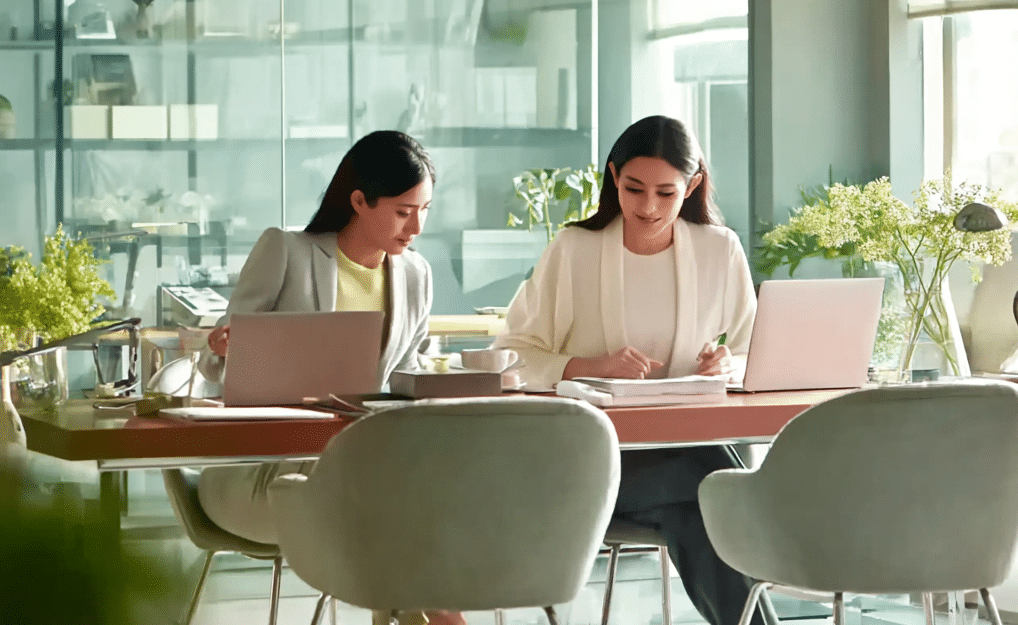 Two professionals in modern office