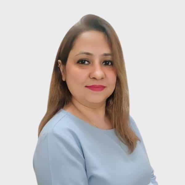 A woman with straight, shoulder-length light brown hair, wearing a light blue top, poses against a plain white background and smiles slightly at the camera—perfect for an IT staffing agency in Toronto’s professional team profile.